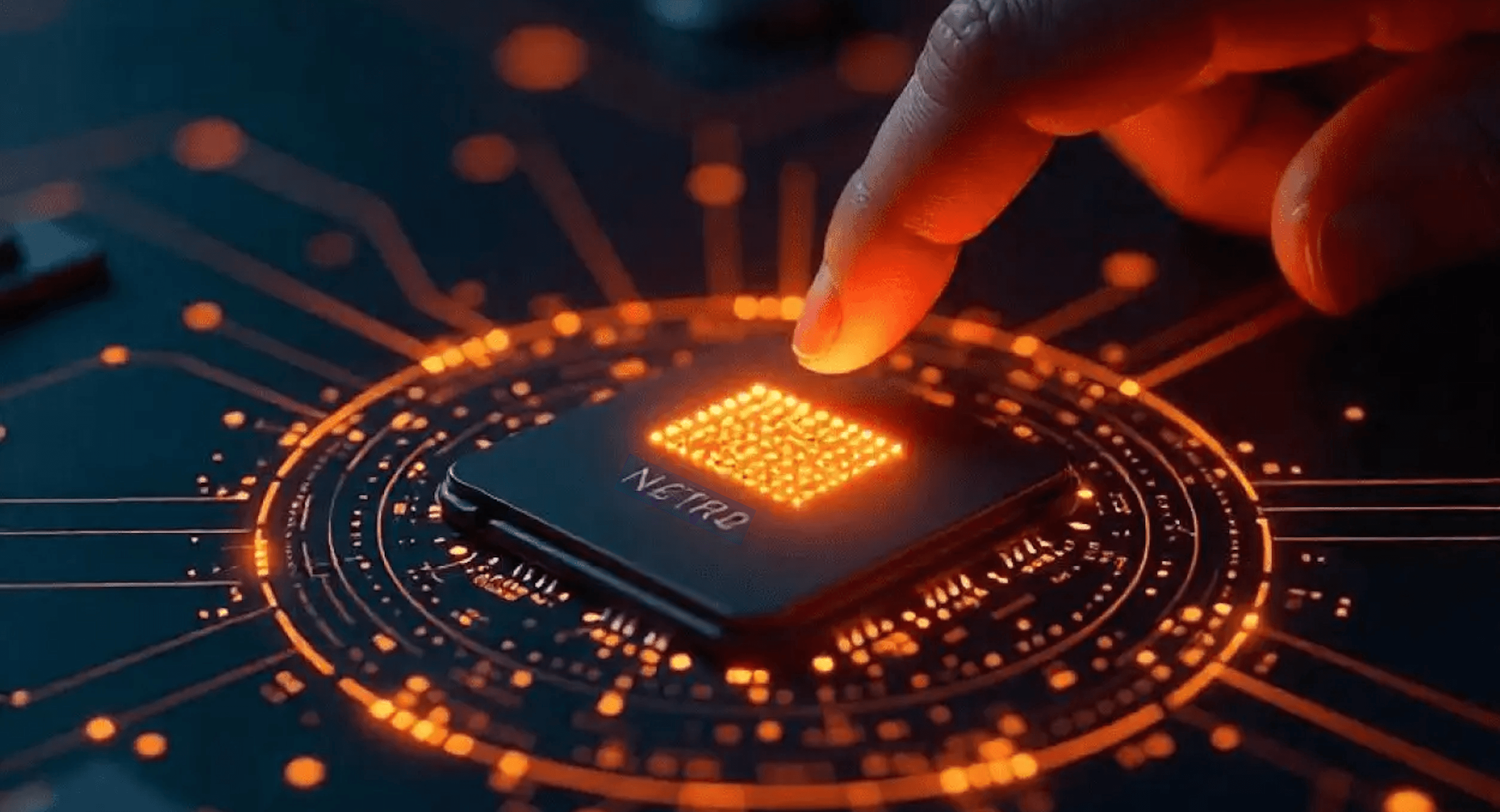 A finger touching a glowing processor, representing advanced technology.
